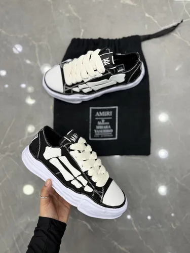 Amiri / Burberry / Louboutin 19